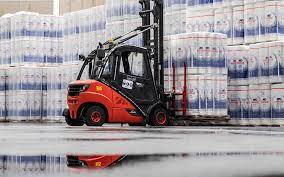 Vehicle moving stock in a warehouse